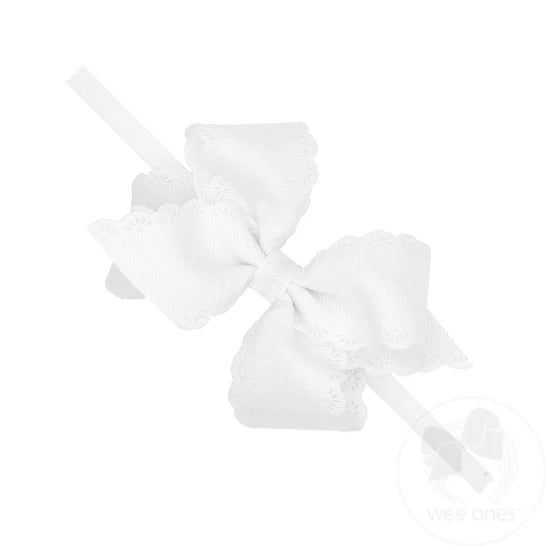 wee ones Small White Hair Bow with Embossed Eyelet Edge on White Nylon Band