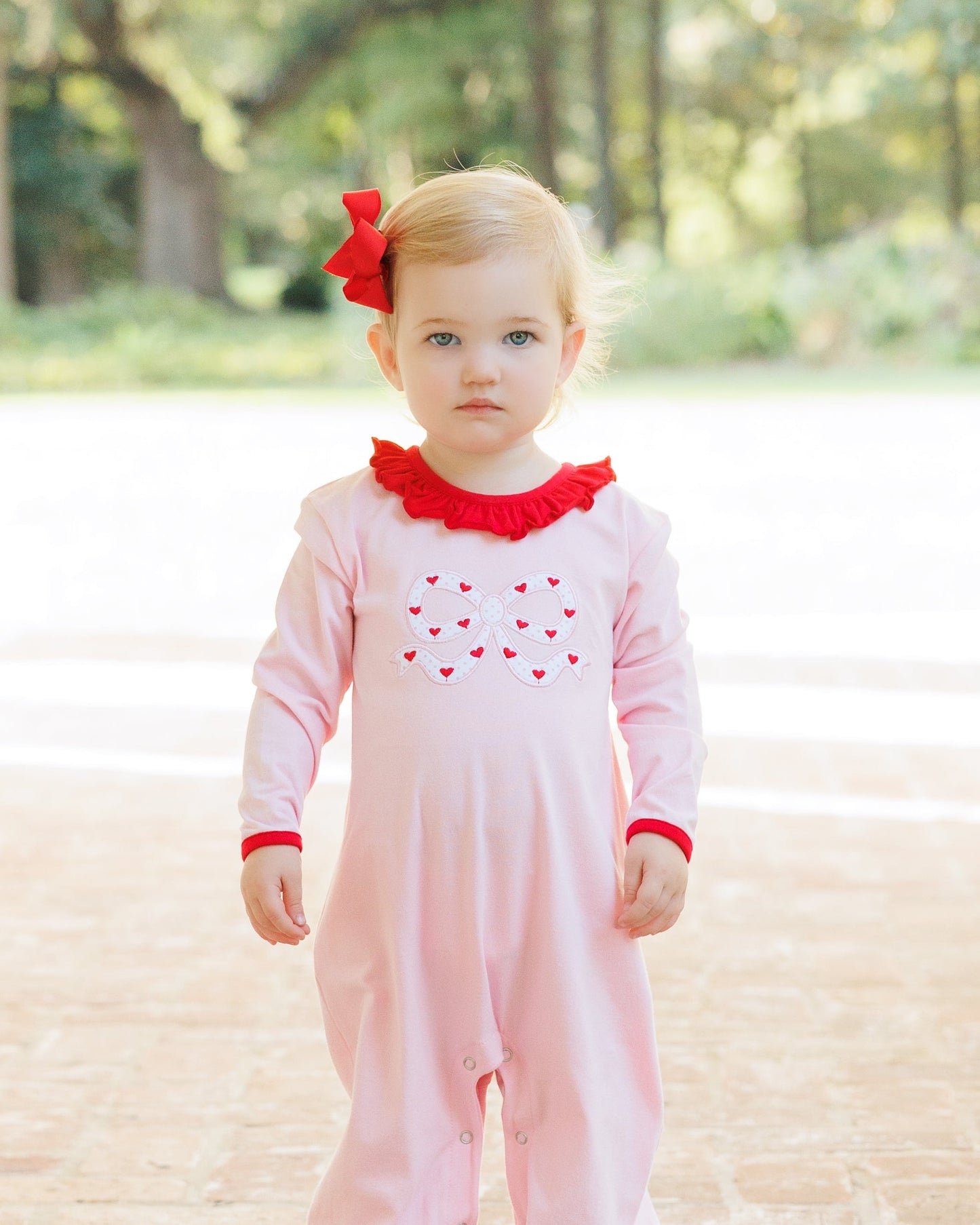 Jellybean Cupid's Bow Ruffle Romper