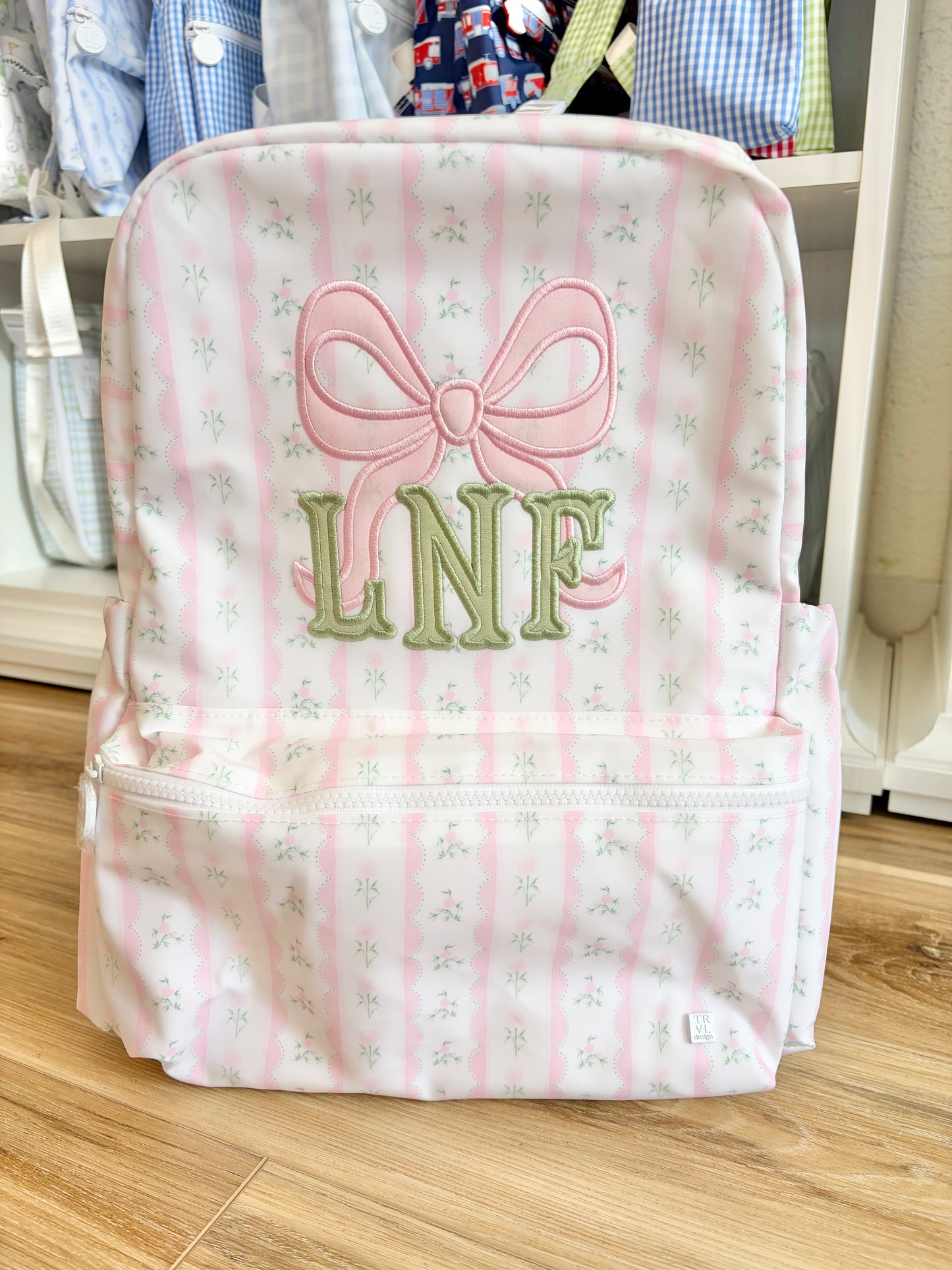 TRVL Pink Ribbon Floral Backpack with Bow Design