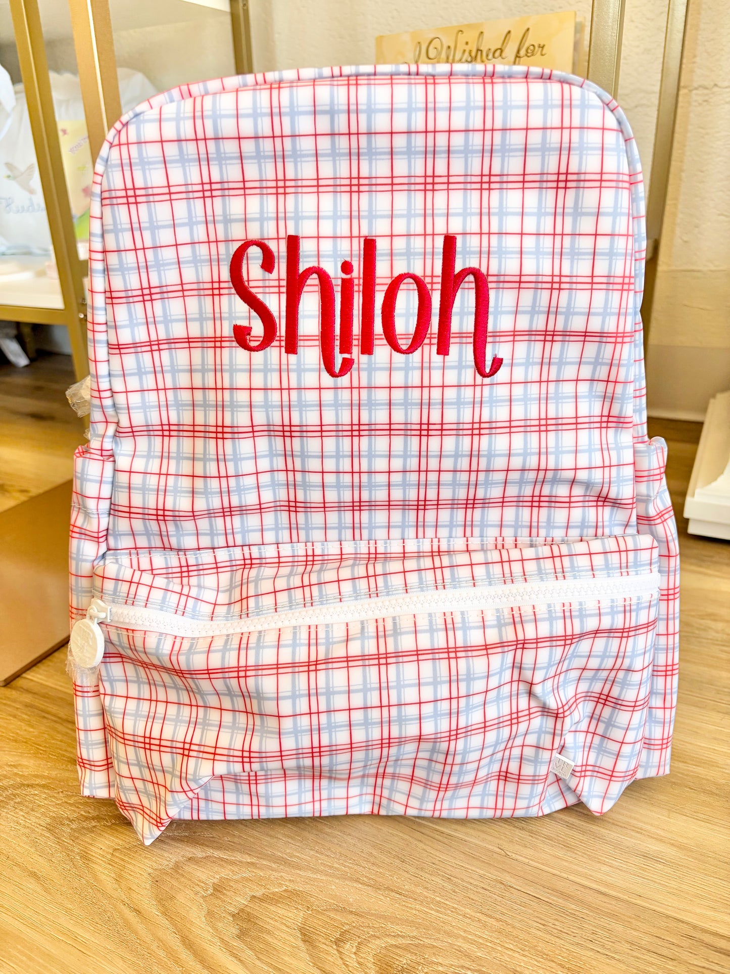 TRVL Classic Red Plaid Backpack with Susie Font