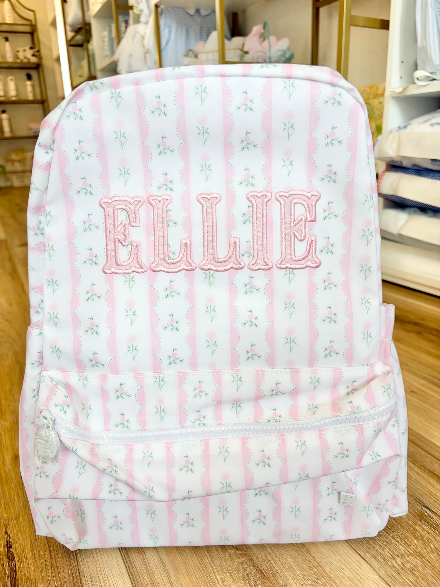 TRVL Pink Ribbon Floral Backpack with Fishtail Font name