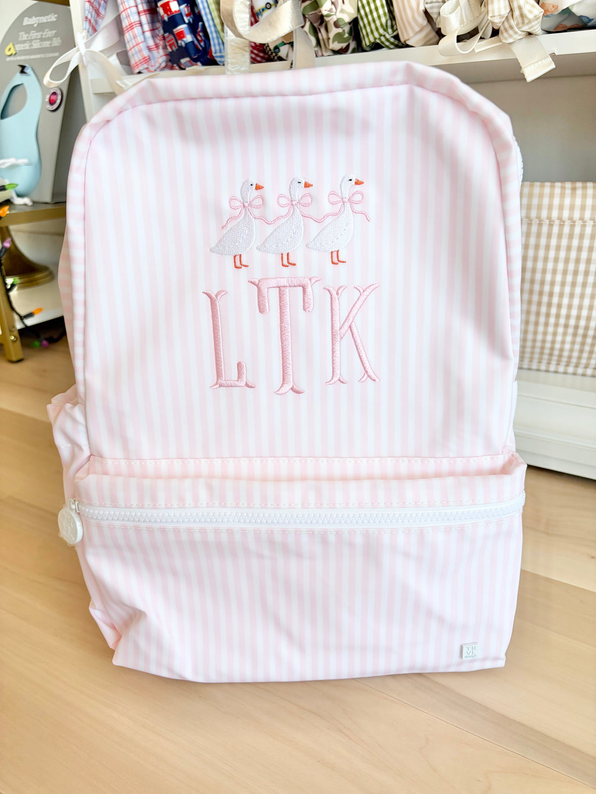 TRVl Pink Stripe Backpack with Goose Trio and Fishtail Initials