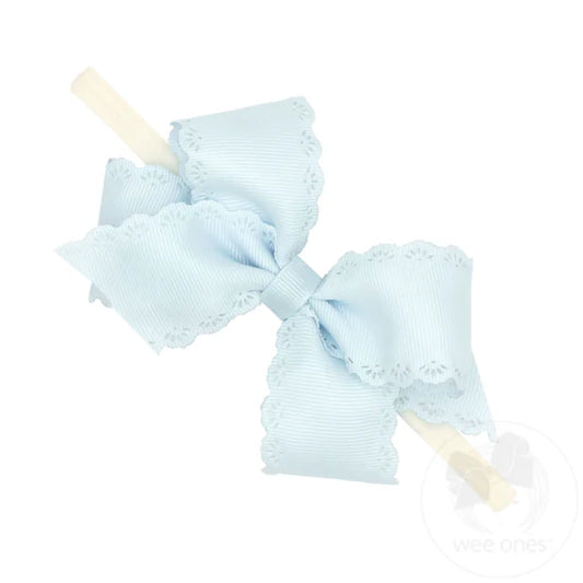 wee ones Small Vapor Blue Hair Bow with Embossed Eyelet Edge on White Nylon Band