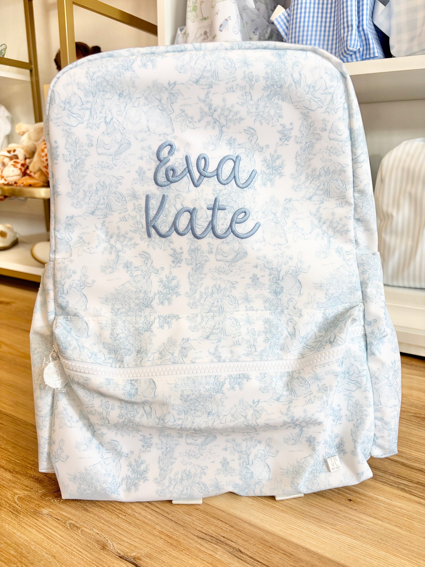 TRVL Blue Bunny Toile Backpack- Bubbly Font name
