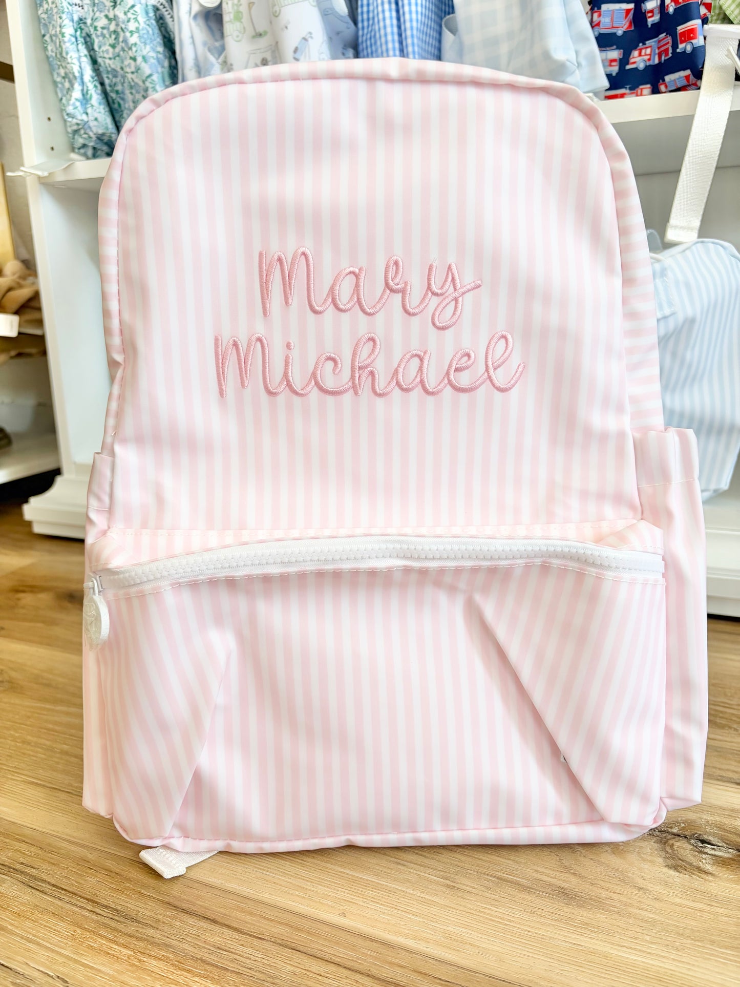 TRVL Pimlico Pink Stripe Backpack with Bubbly Font