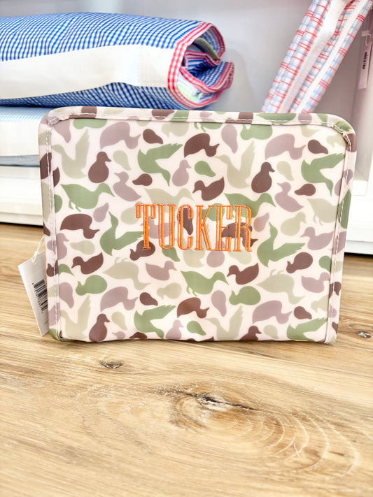 TRVL Camo Decoy Large Roadie with Orange Name Font