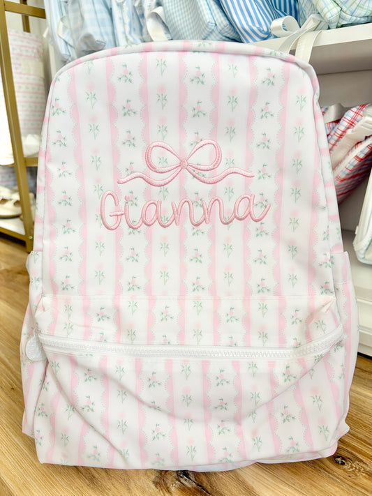 TRVL Pink Ribbon Floral Backpack with Single Name with Bow Design