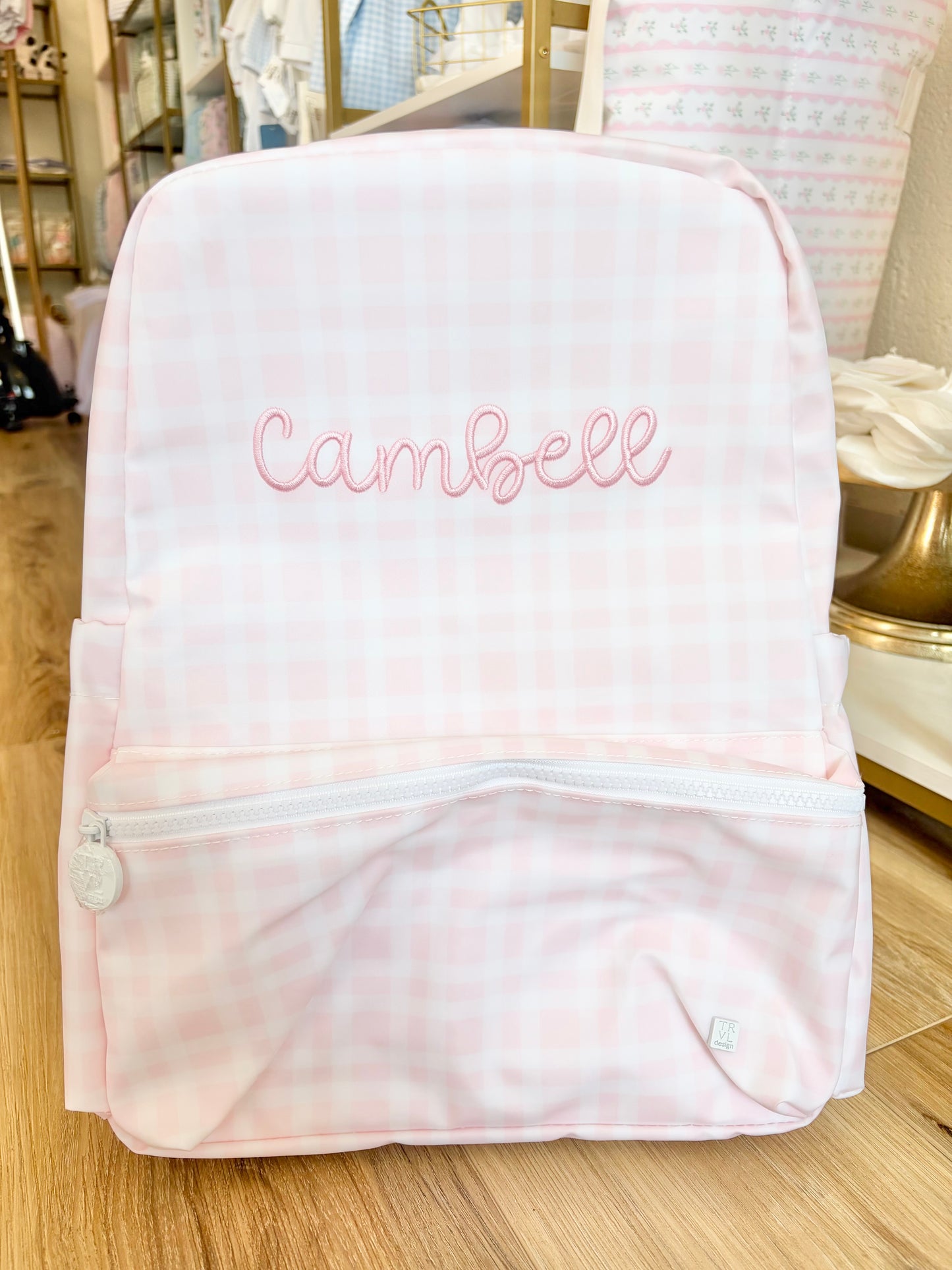 TRVL Pink Plaid Backpack with Bubbly Font Name