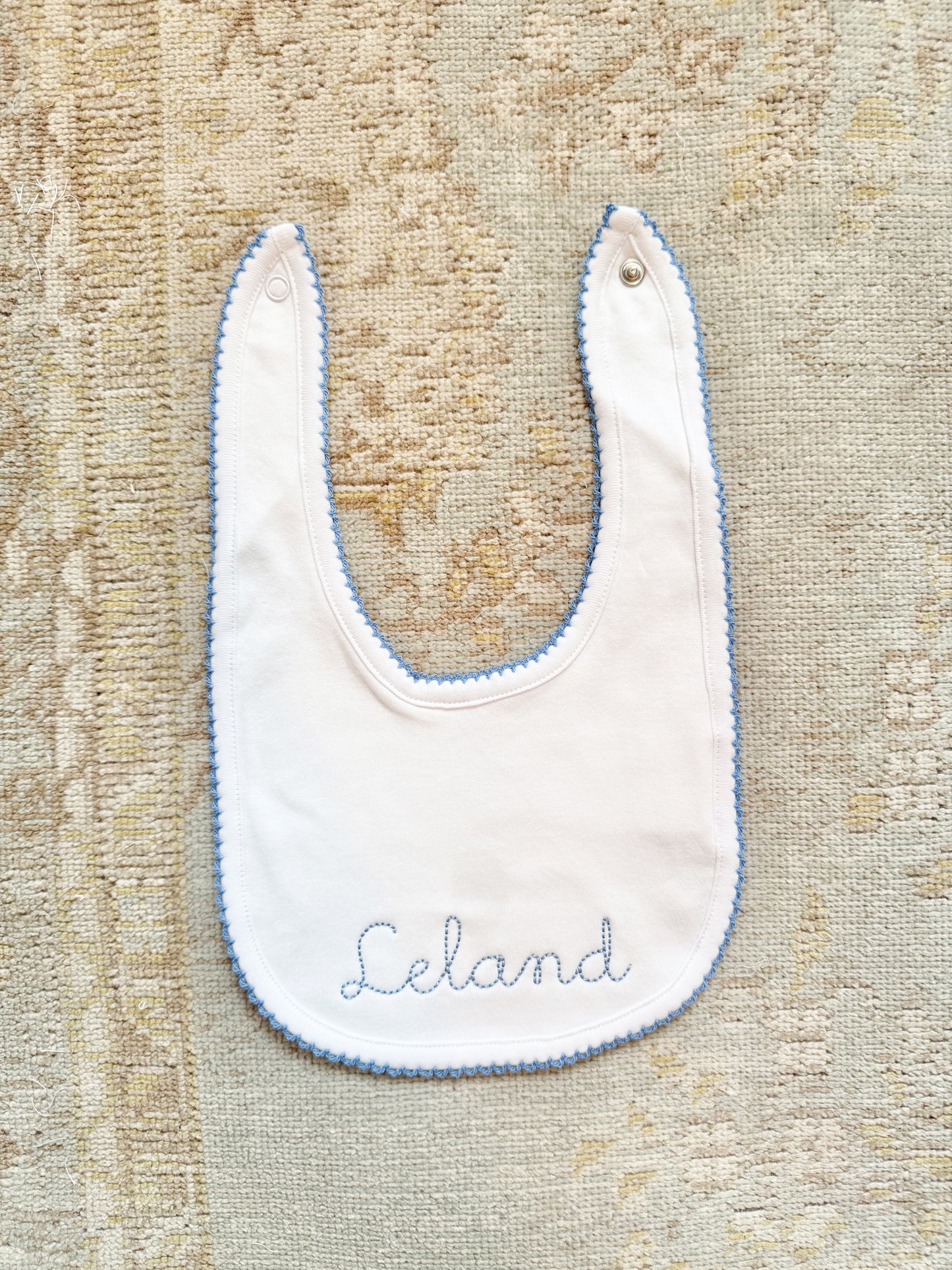 Blue Trim Baby Bib