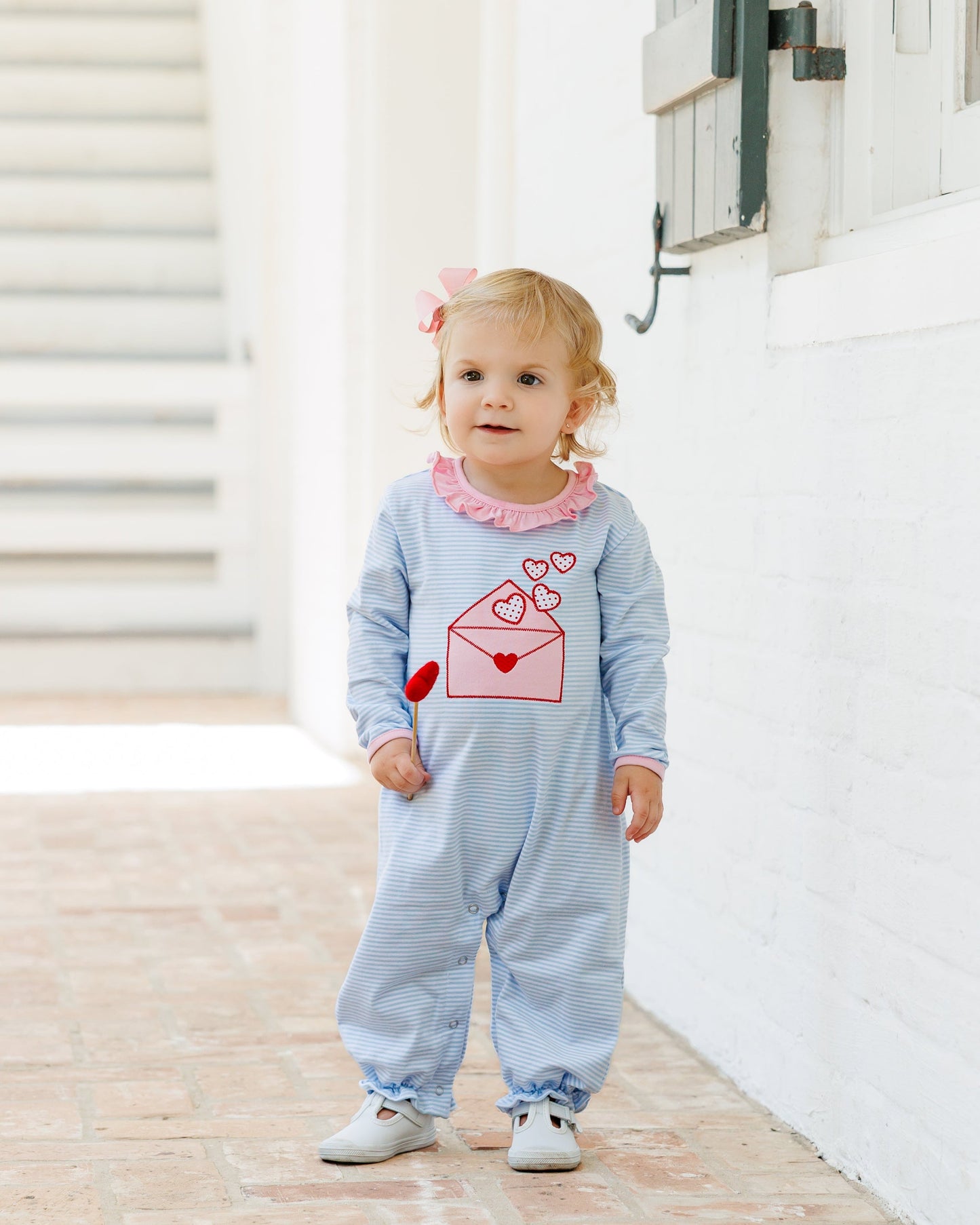 Jellybean Love Letters Ruffle Romper